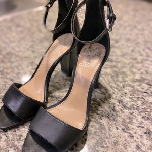 Black Vince Camuto heel with ankle strap.